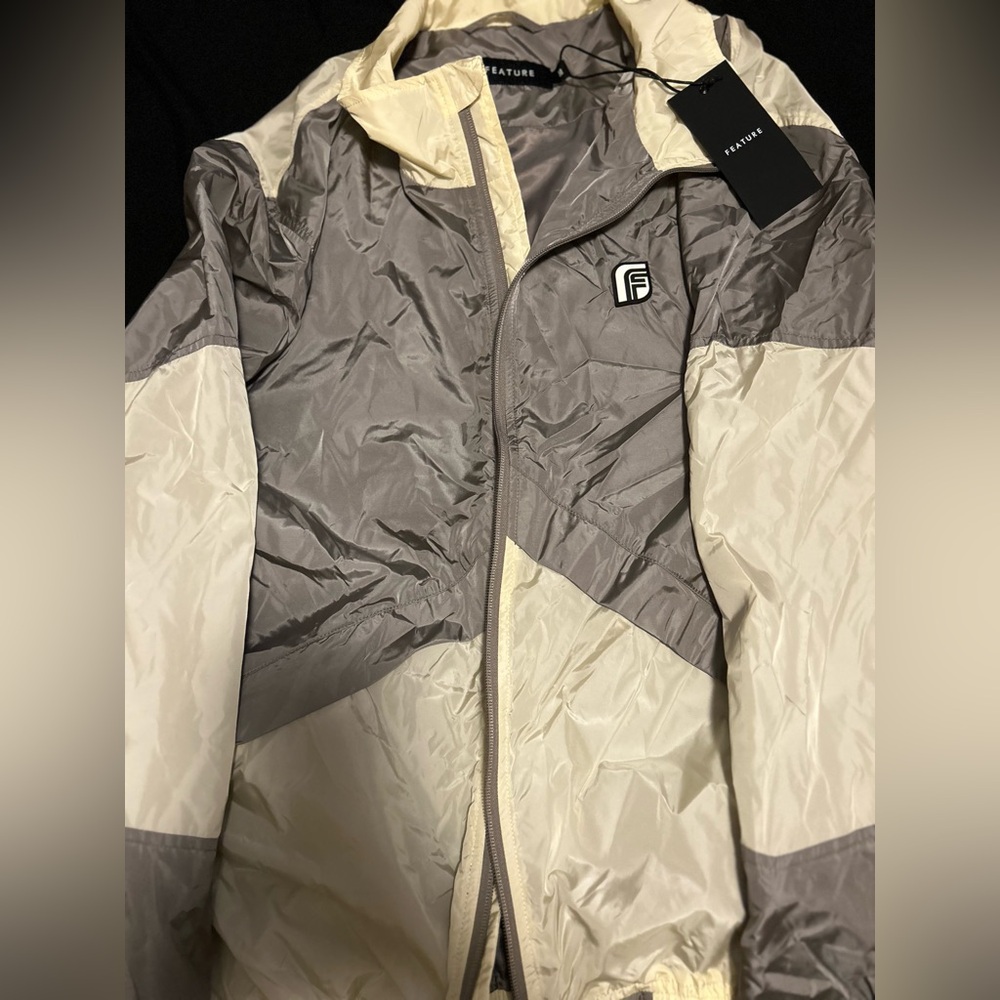 Stylish Gray and Cream Windbreaker with Weather-Resistant Fabric